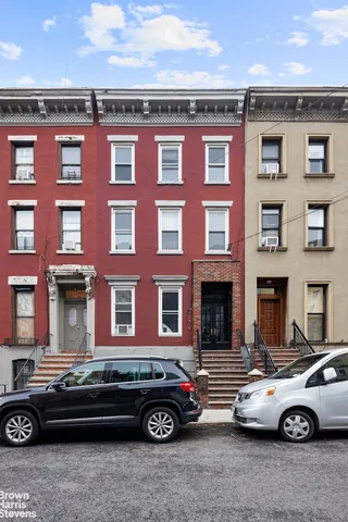 a bathroom with a sink toilet a mirror and shower