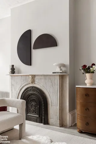 a bedroom with bed and a window