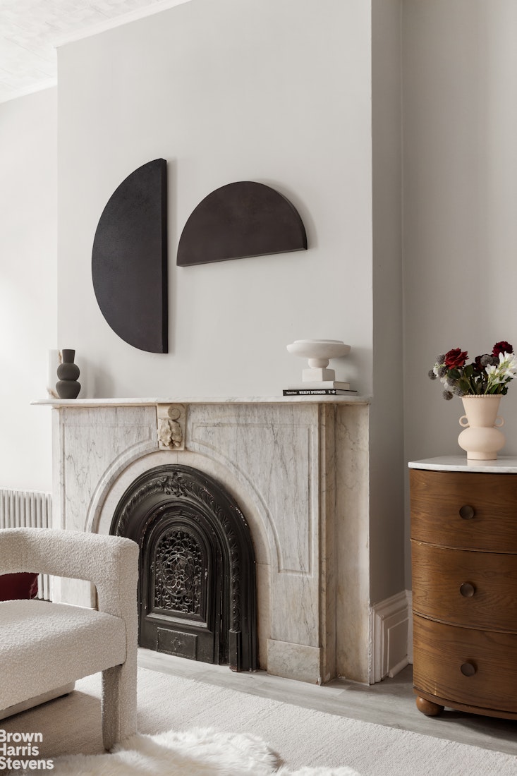 91 Berry Street Brooklyn, NY 11249 - Photo 4 of 14 a living room with furniture and a fireplace