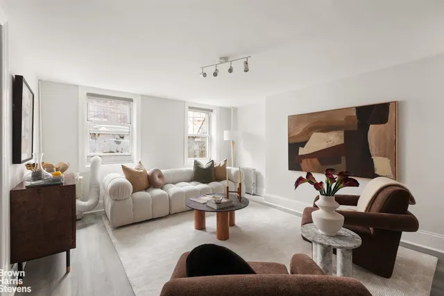 a view of a yard with potted plants
