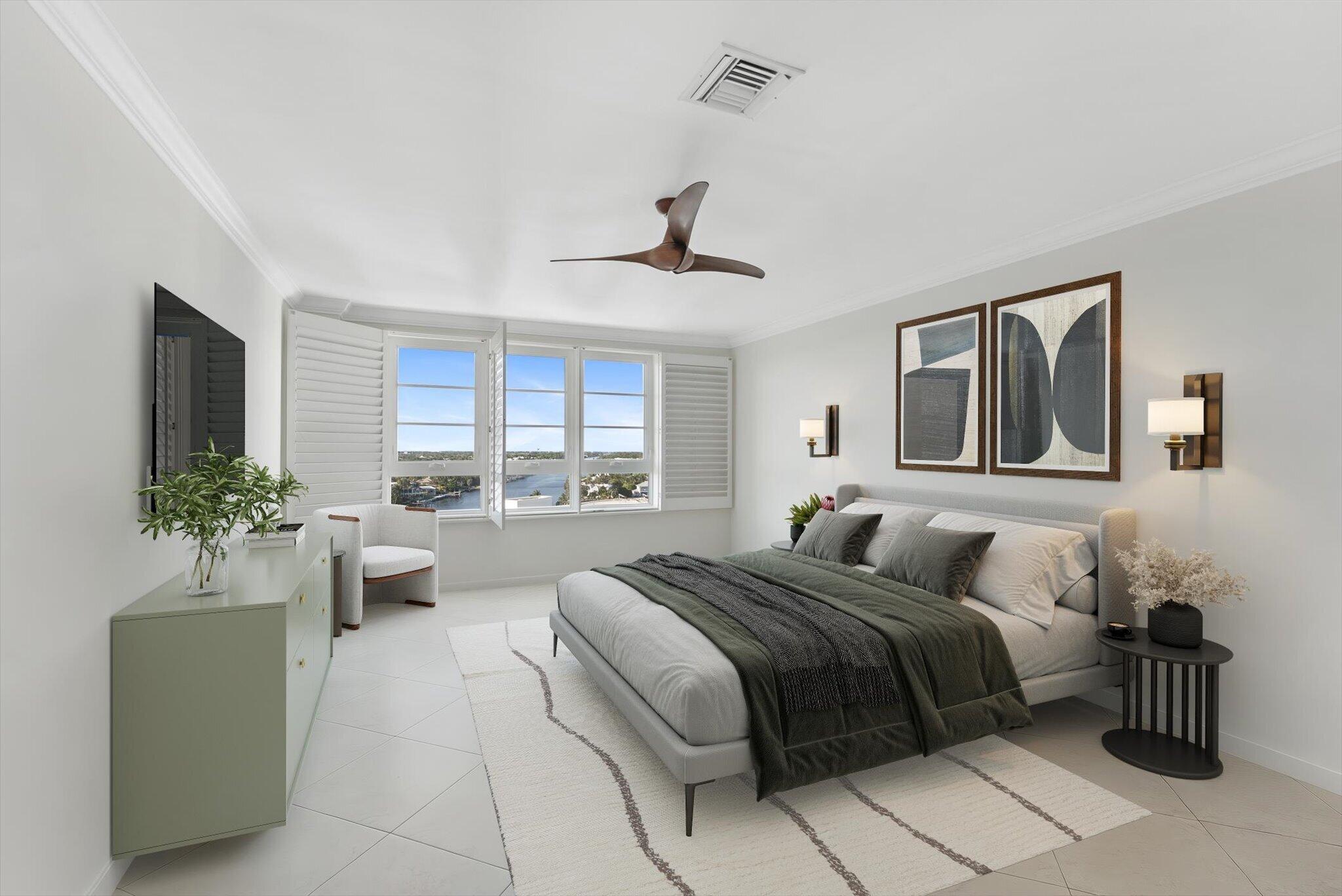 50 E Road, Unit 12A Delray Beach, FL 33483 - Photo 25 of 47 a bedroom with a large bed and a chandelier