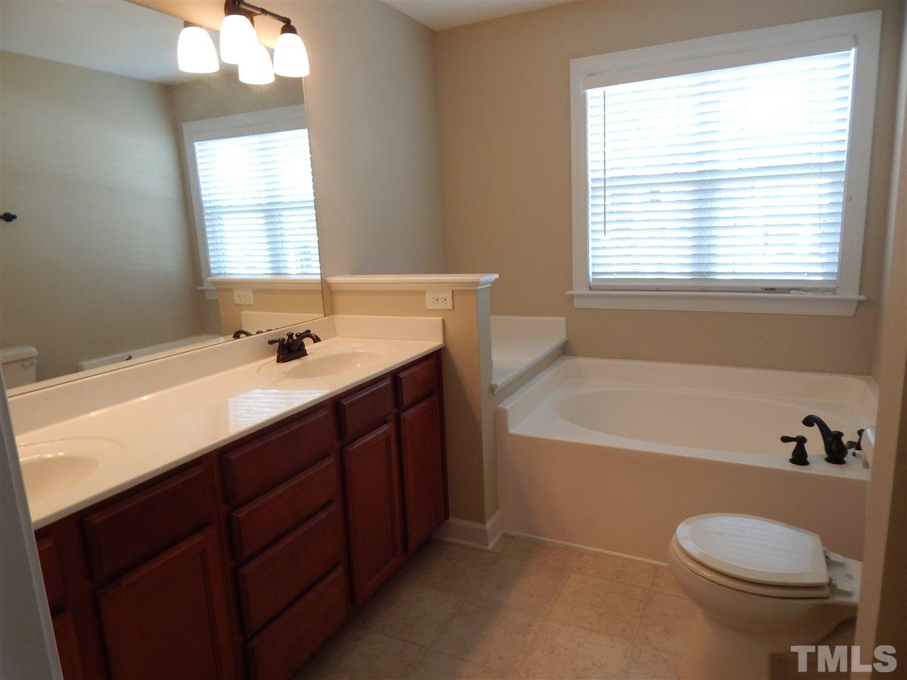 3513 Provost Street Raleigh, NC 27603 - Photo 15 of 25 Plenty of counter space on the vanity