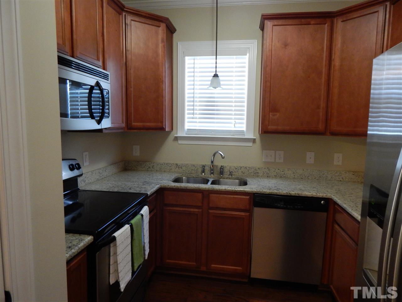 3513 Provost Street Raleigh, NC 27603 - Photo 6 of 25 42" Cabinets with updated counter tops and appliances