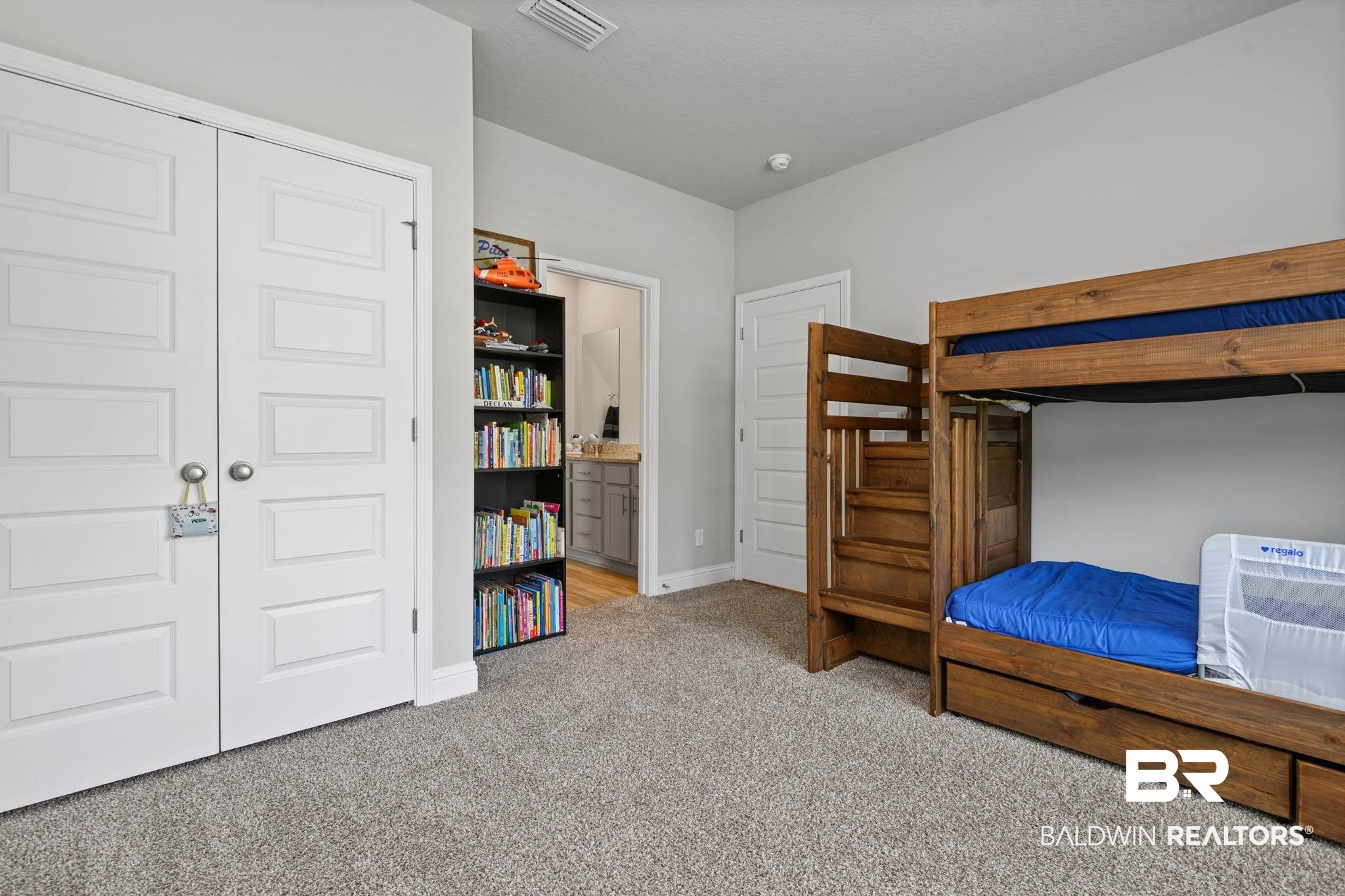 2183 Meadowview Loop Semmes, AL 36575 - Photo 16 of 58 Bedroom with light carpet and a closet