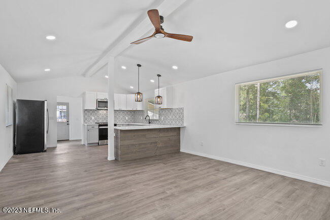 3167 Dothan Road Green Cove Springs, FL 32043 - Photo 5 of 33 Open floor concenpt with picture windows