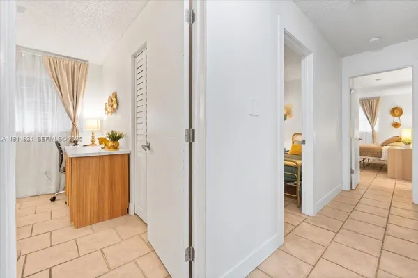 a view of a bedroom from the hallway