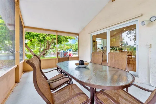 a view of a swimming pool with a lounge chair