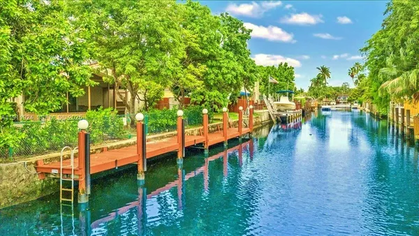 a view of a lake with houses