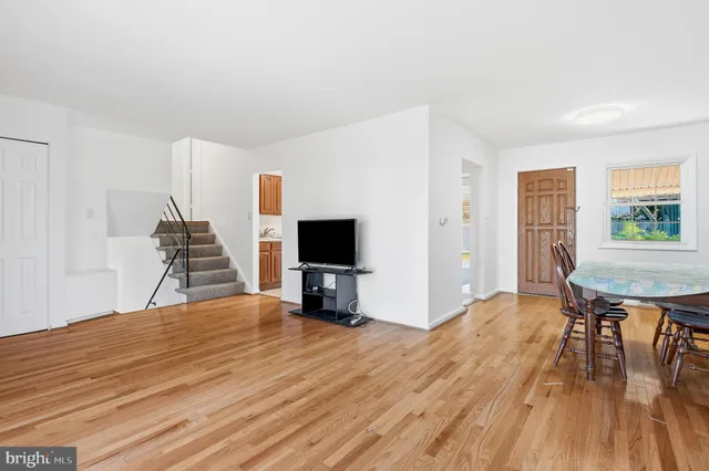 a view of a livingroom with furniture and wooden floor