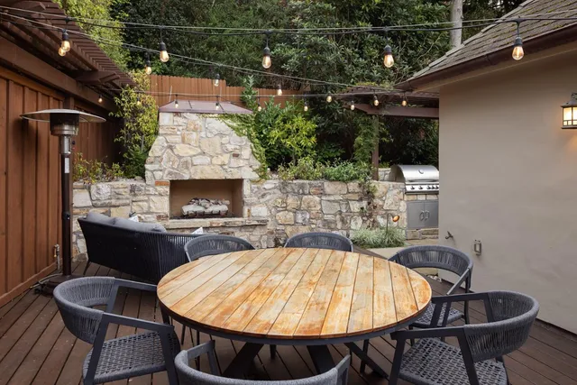 a table and chairs in a balcony