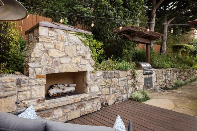 a view of a chairs and table in the patio
