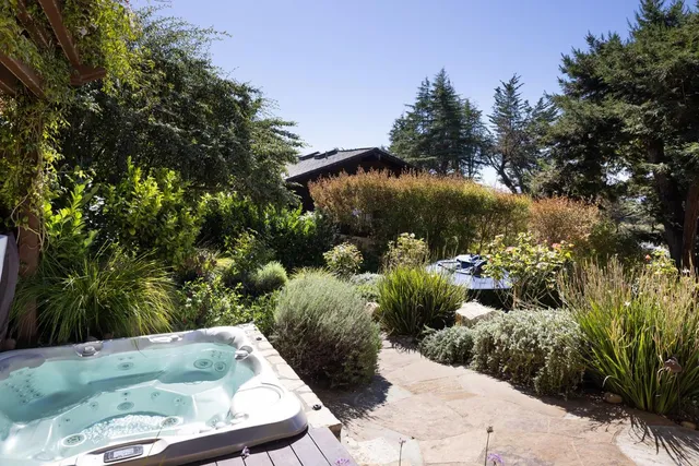 a view of a back yard of the green space