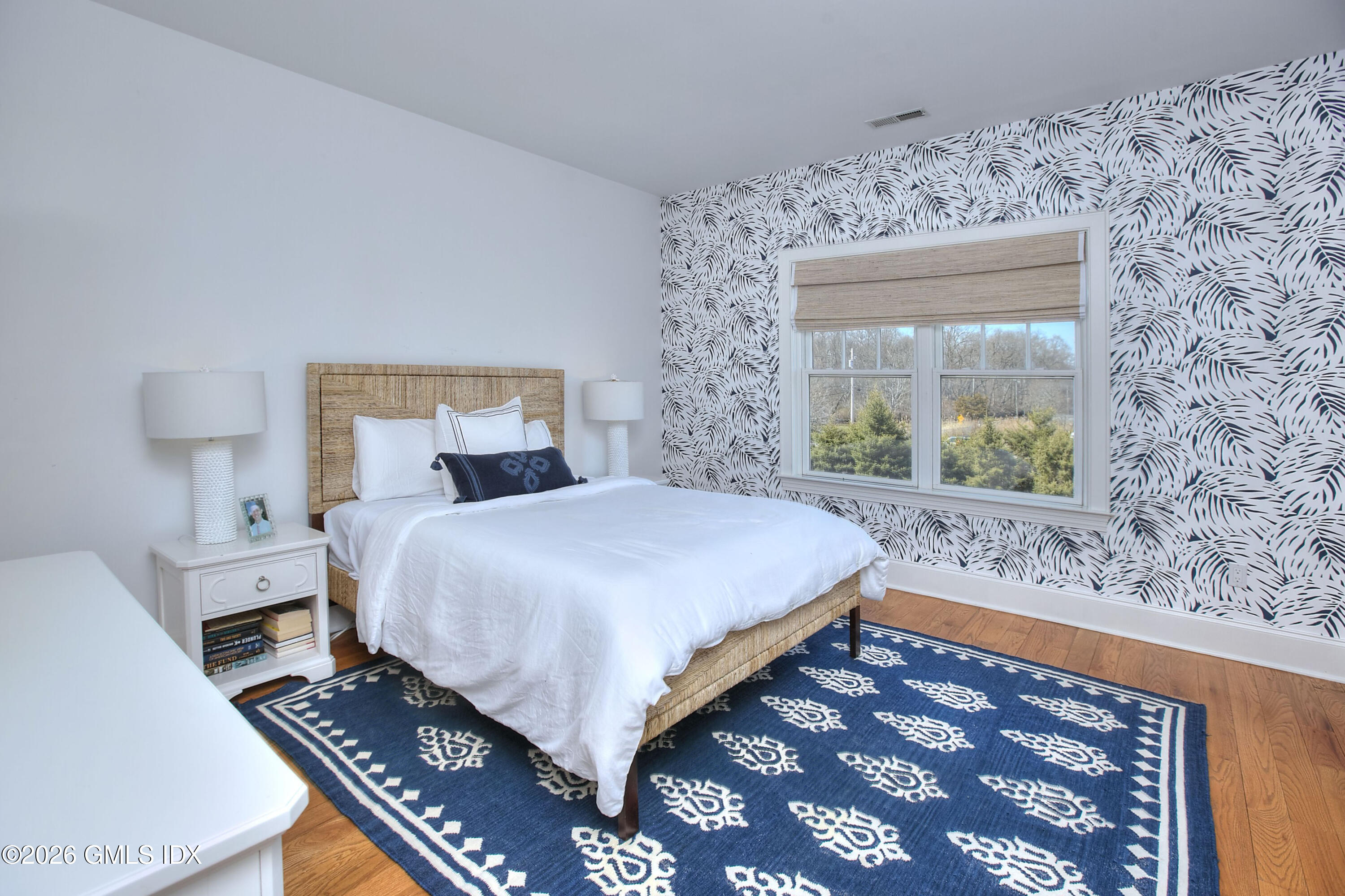 3 Shorehaven Road Norwalk, CT 06855 - Photo 28 of 40 a bedroom with a bed and a window