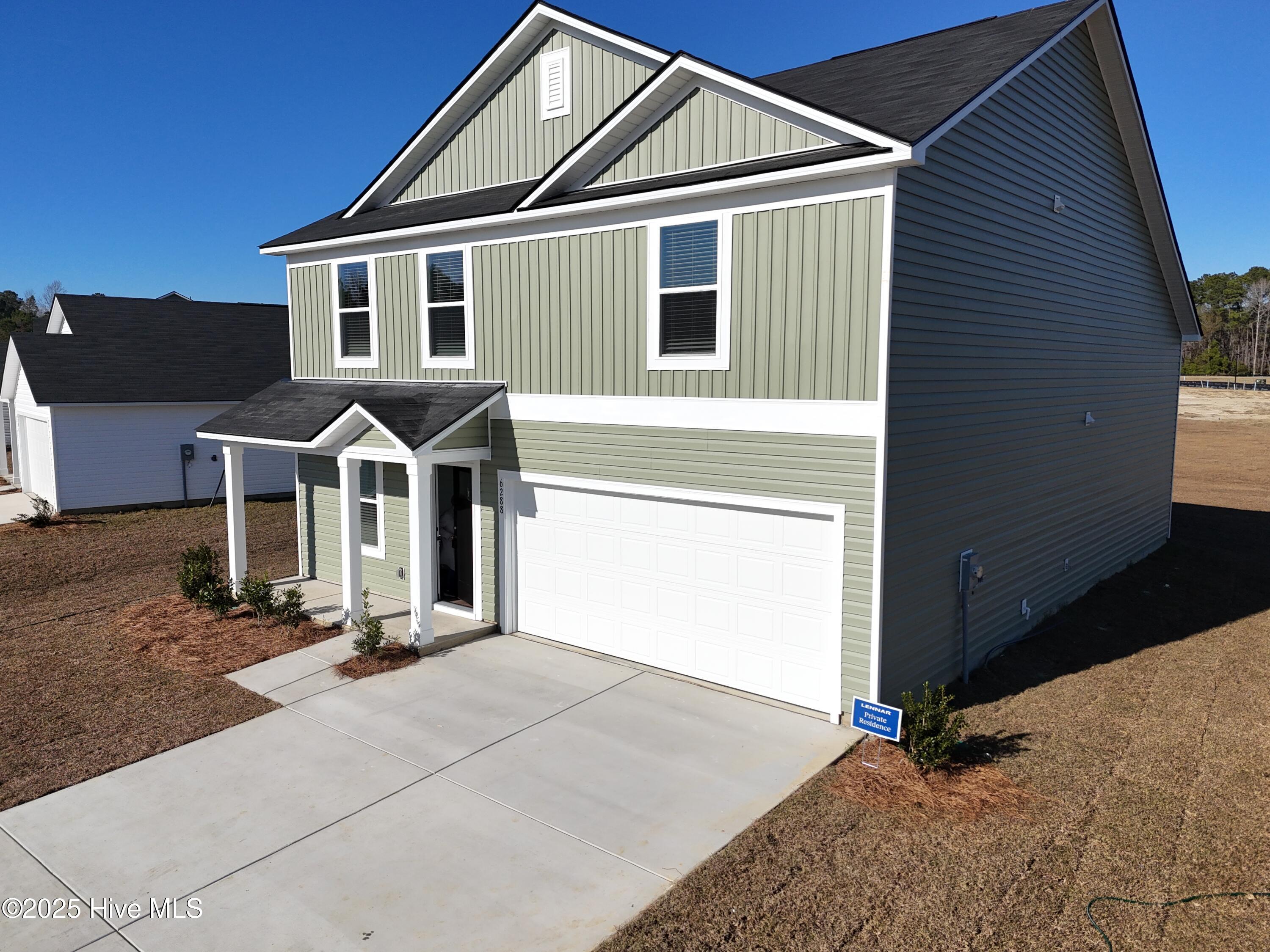 6288 Swainson Street Southwest, Unit LOT 115 LITTLETON Ocean Isle Beach, NC 28469 - Photo 2 of 15 DJI_20251129135405_0004_D