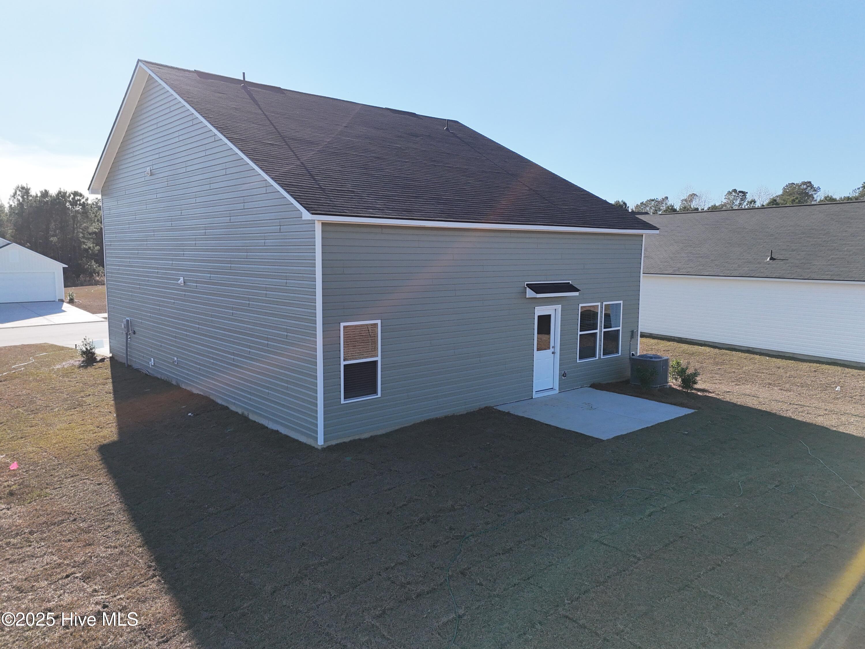 6288 Swainson Street Southwest, Unit LOT 115 LITTLETON Ocean Isle Beach, NC 28469 - Photo 3 of 15 DJI_20251129135435_0005_D