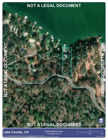 a aerial view of a house with a yard