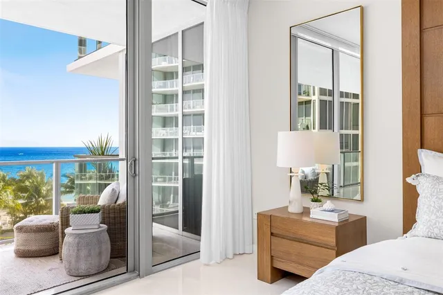 a view of a patio with swimming pool table and chairs