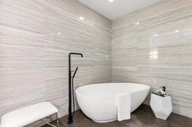 swimming pool view with a outdoor seating space