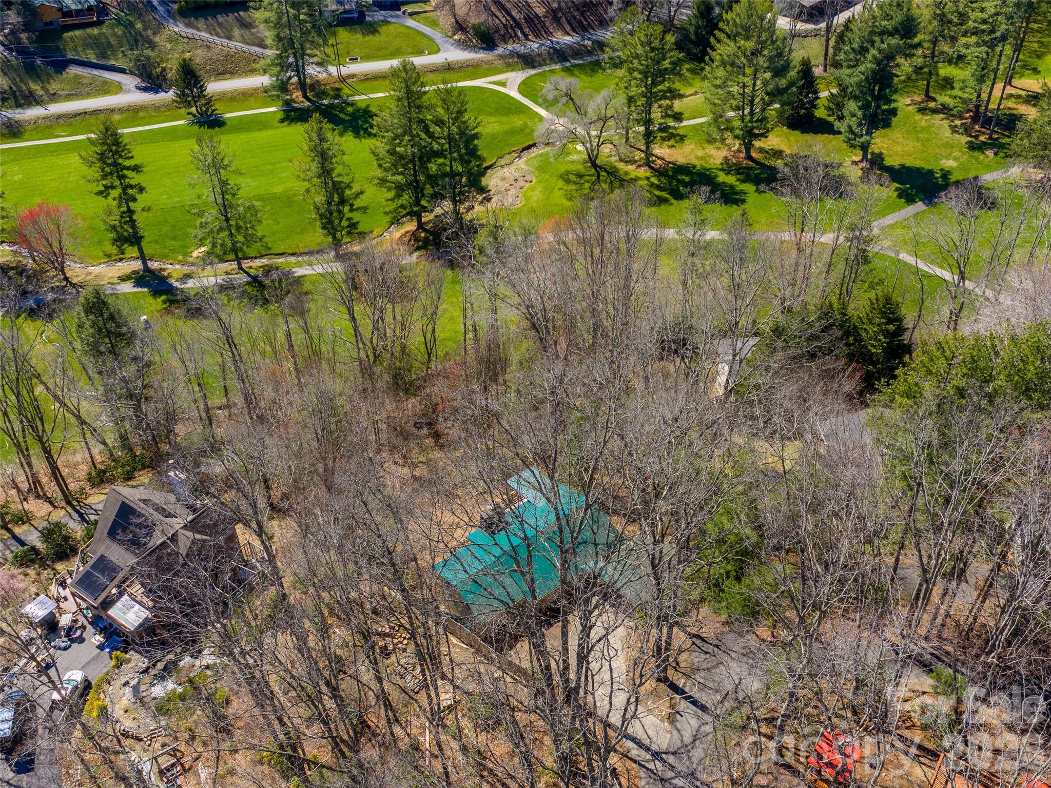 174 Pleasant Ridge Drive Maggie Valley, NC 28751 - Photo 45 of 45 a view of a lake with outdoor space