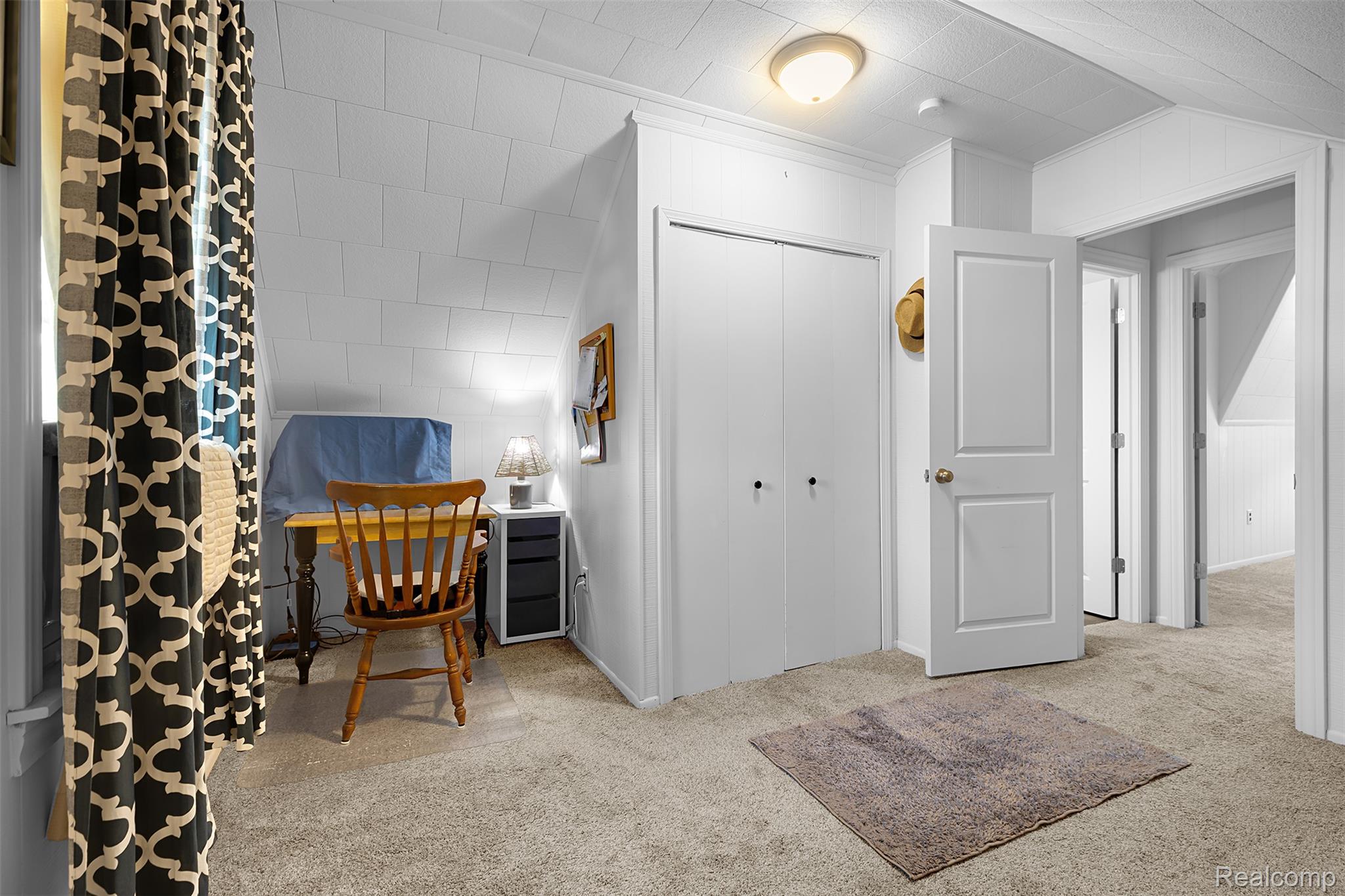 22827 Meridian Road Grosse Ile, MI 48138 - Photo 35 of 36 Sitting room featuring light colored carpet and built in study area