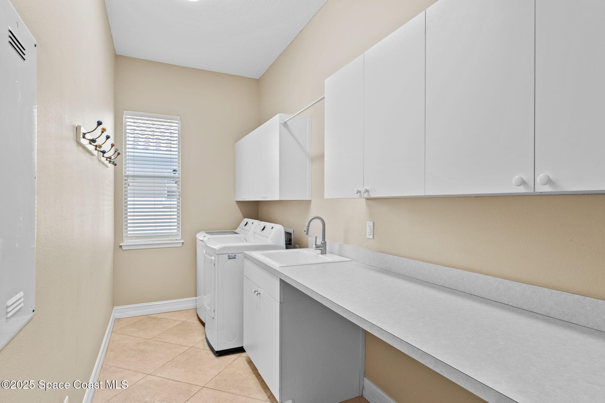 3338 Cappio Drive Melbourne, FL 32940 - Photo 25 of 43 Laundry Room