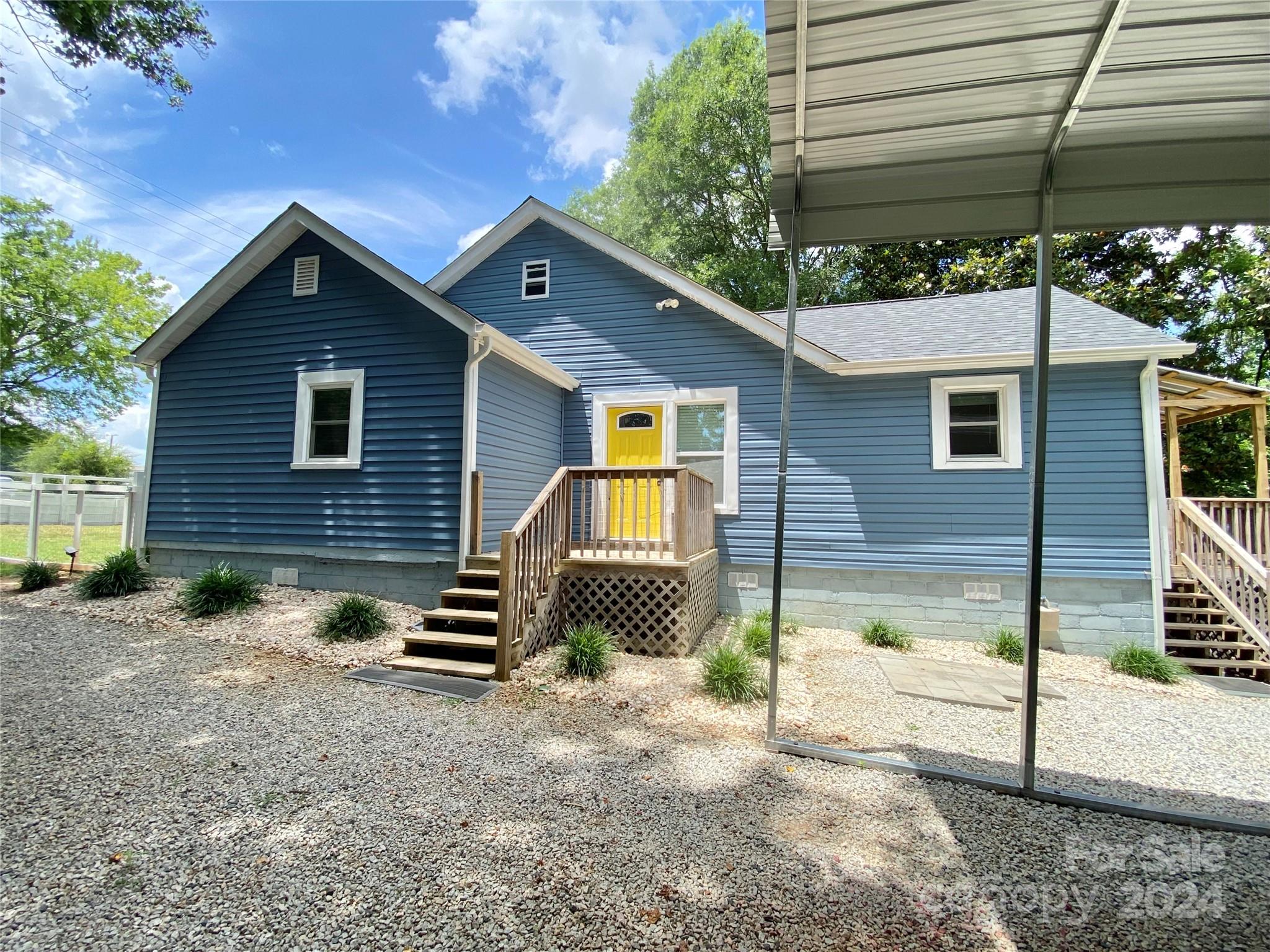 4250 Potneck Road Woodleaf, NC 27054 - Photo 7 of 36 a front view of a house with a yard