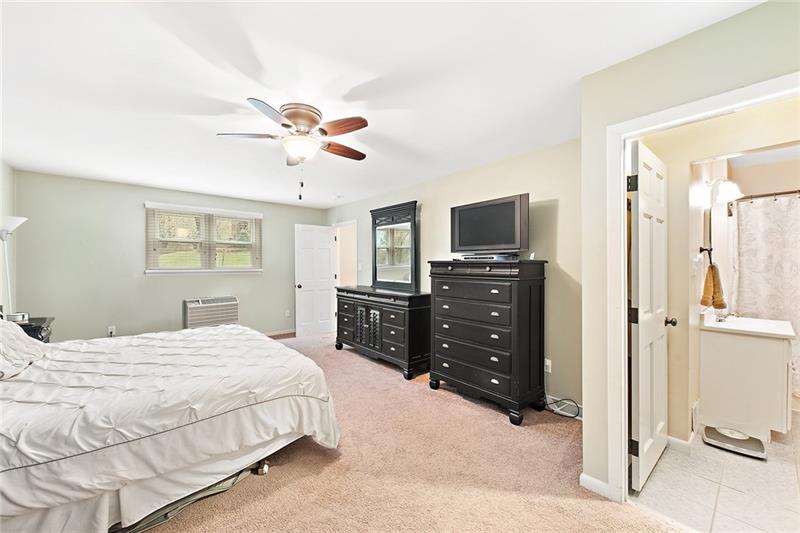 14 Winding Road Leetsdale, PA 15056 - Photo 14 of 25 The main level master suite also has a stack-able washer and dryer for convenience. A second laundry room is located in the lower level as well.