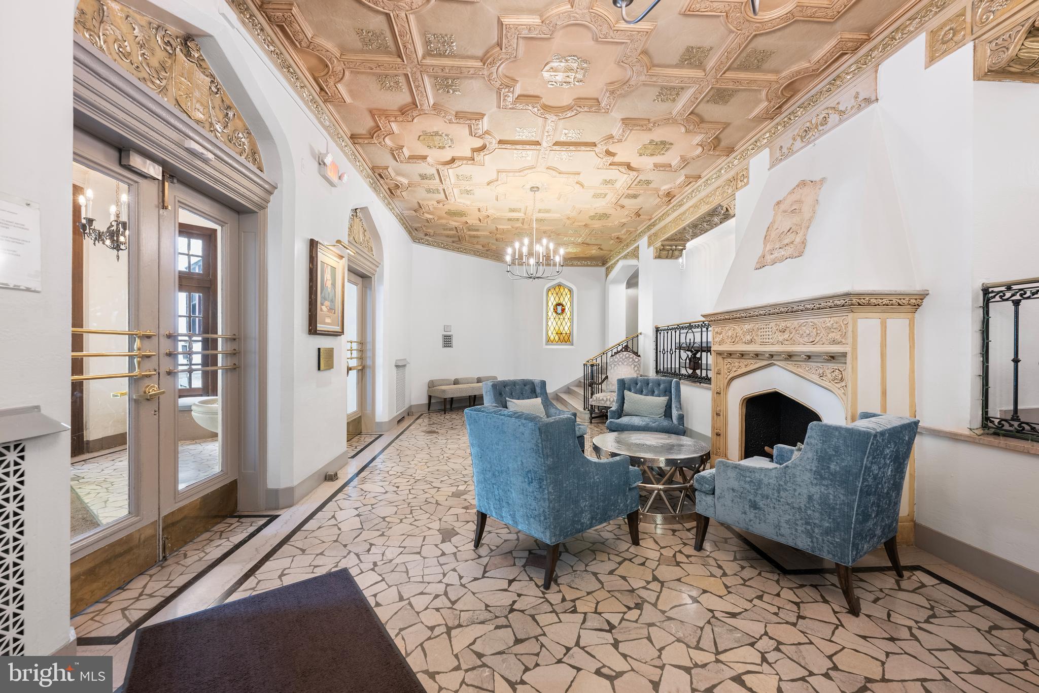 4701 Connecticut Avenue Northwest, Unit 501 Washington, DC 20008 - Photo 3 of 28 a living room with furniture and a fireplace