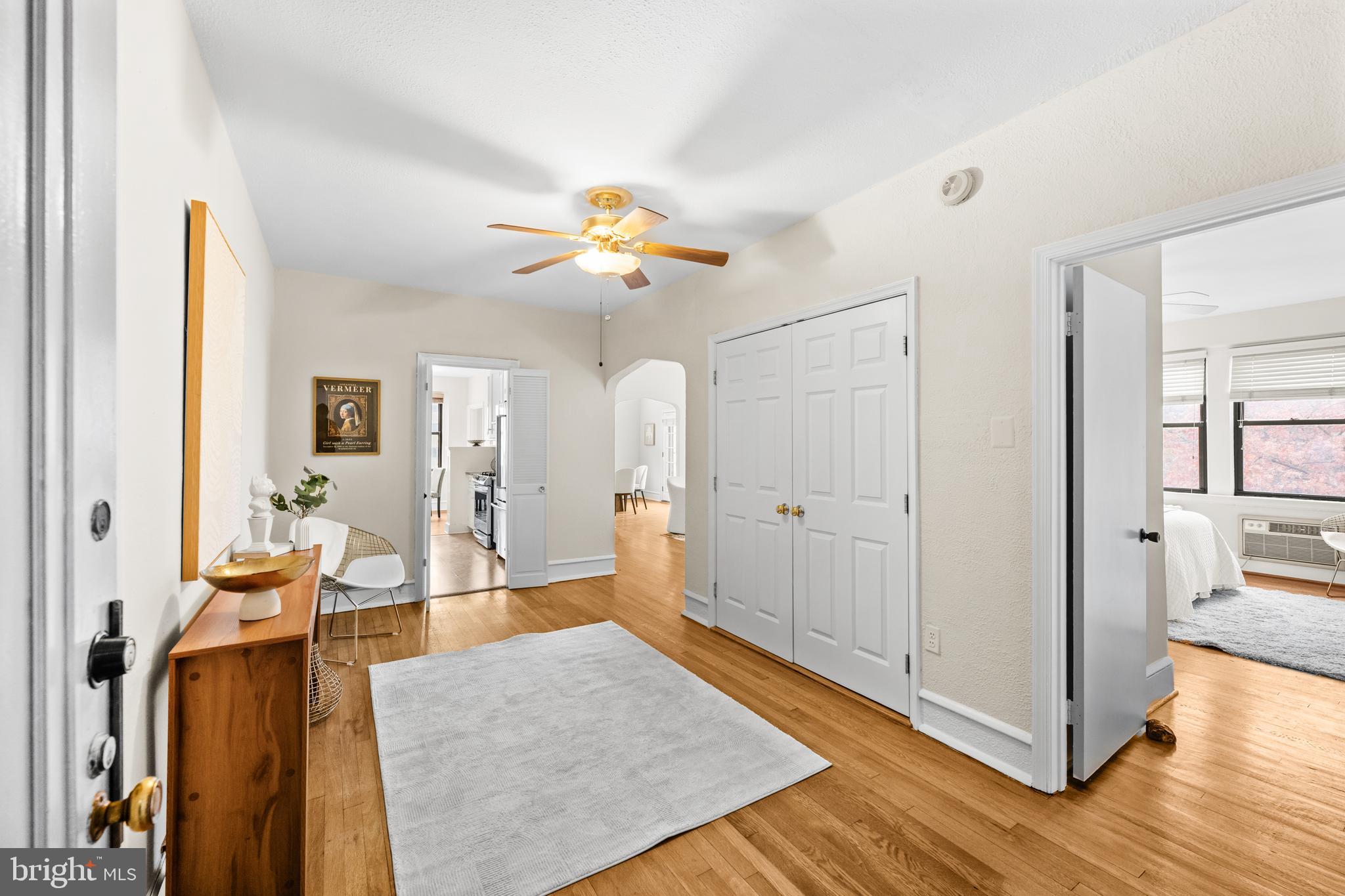 4701 Connecticut Avenue Northwest, Unit 501 Washington, DC 20008 - Photo 4 of 28 a living room with furniture and wooden floor