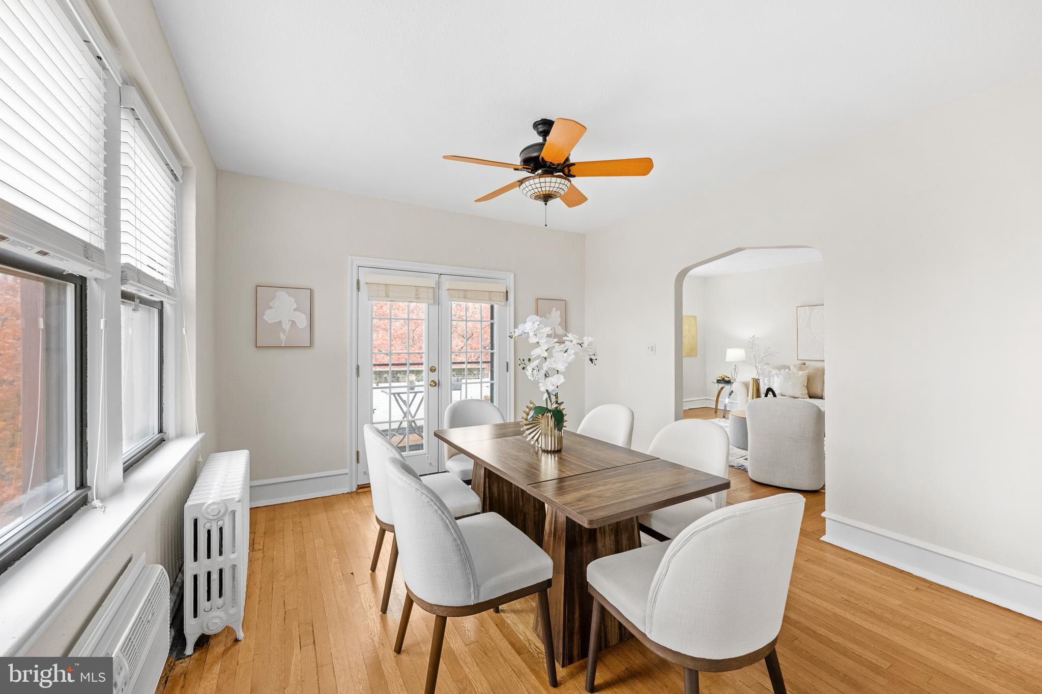 4701 Connecticut Avenue Northwest, Unit 501 Washington, DC 20008 - Photo 9 of 28 a view of a dining room with furniture window and wooden floor