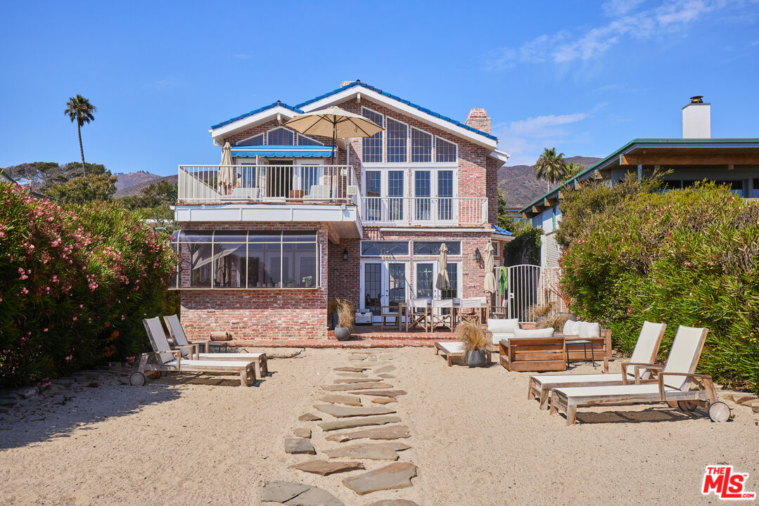 30870 Broad Beach Road Malibu, CA 90265 - Photo 2 of 28 a front view of a building with sitting area