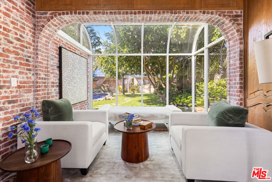 30870 Broad Beach Road Malibu, CA 90265 - Photo 6 of 28 a living room with furniture and a potted plant