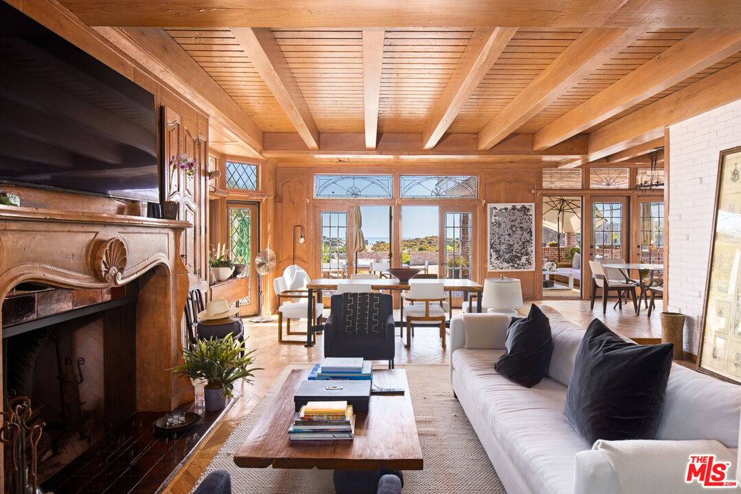 30870 Broad Beach Road Malibu, CA 90265 - Photo 7 of 28 a living room with furniture and a flat screen tv