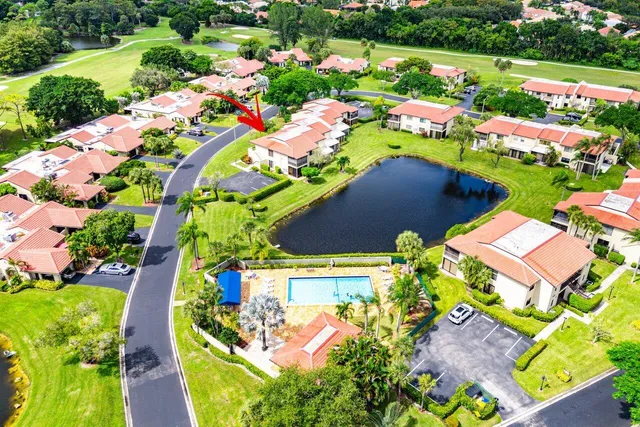 an aerial view of a swimming pool and outdoor space