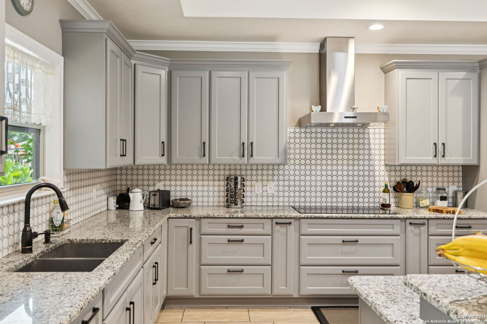 450 Georg Oaks Bulverde, TX 78163 - Photo 18 of 41 a kitchen with cabinets appliances and a sink