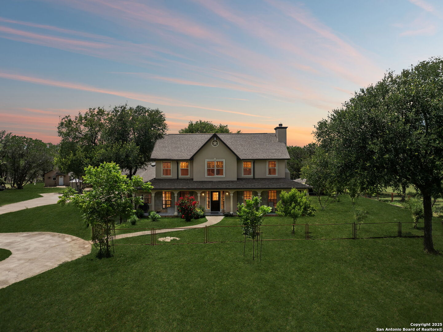 450 Georg Oaks Bulverde, TX 78163 - Photo 2 of 41 a front view of a house with a garden