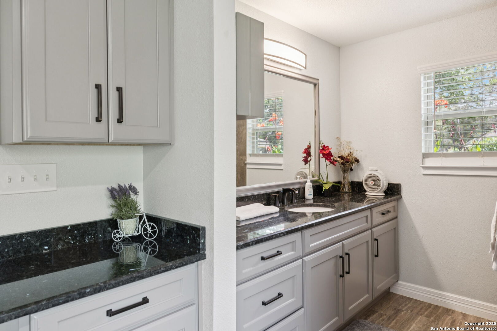 450 Georg Oaks Bulverde, TX 78163 - Photo 21 of 41 a kitchen with white cabinets and sink