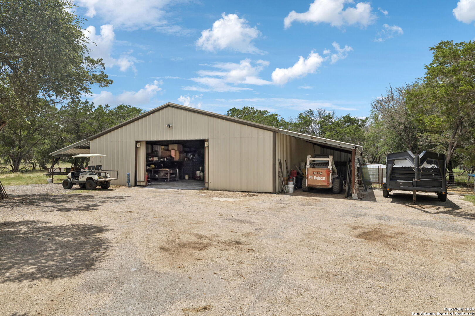 450 Georg Oaks Bulverde, TX 78163 - Photo 29 of 41 a front view of a house with a yard and garage