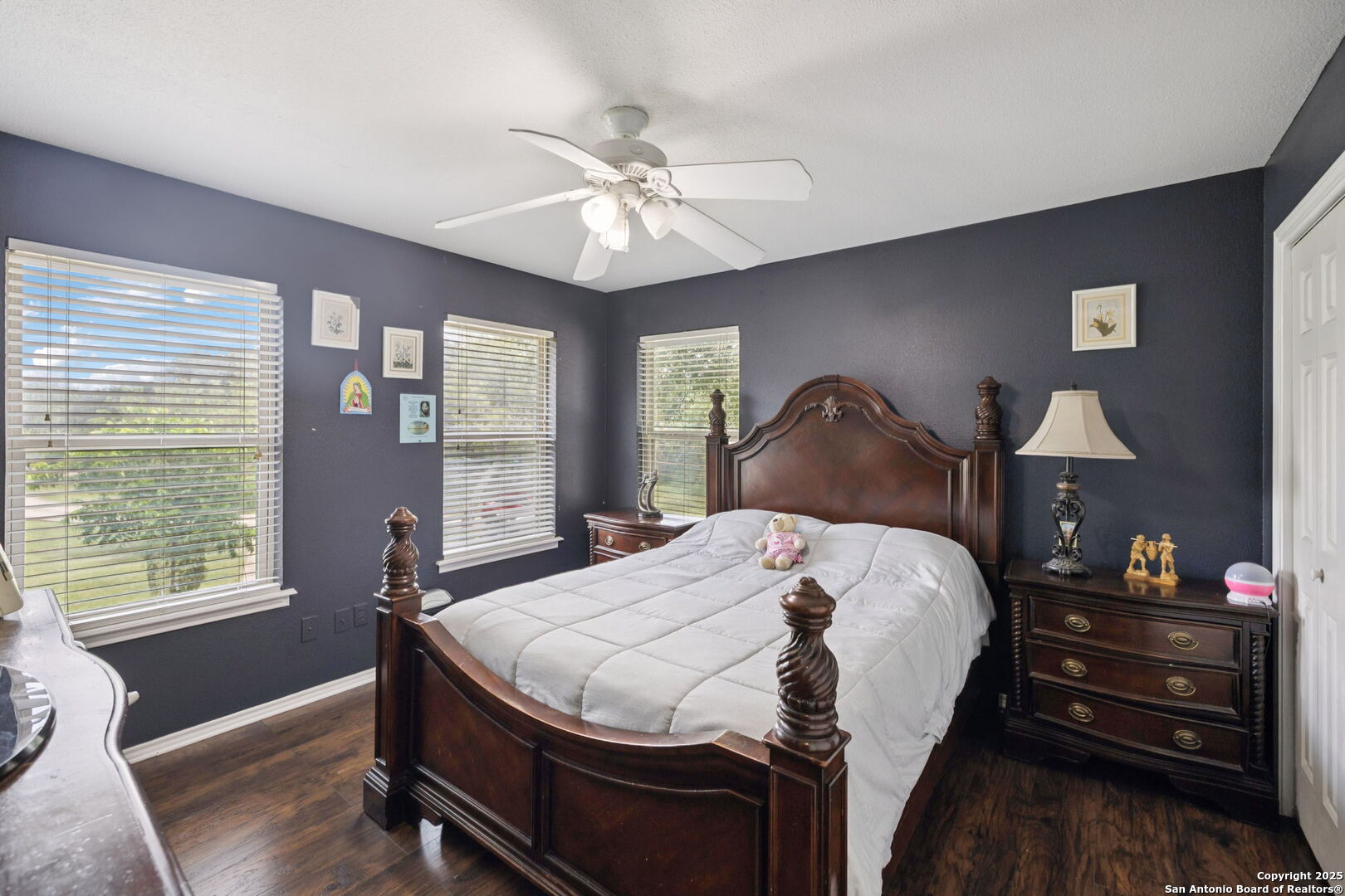 450 Georg Oaks Bulverde, TX 78163 - Photo 40 of 41 a bedroom with a bed and wooden floor