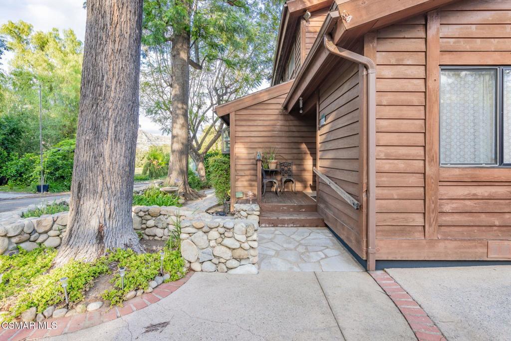 6078 Peppertree Lane Simi Valley, CA 93063 - Photo 4 of 59 a view of a house with a yard