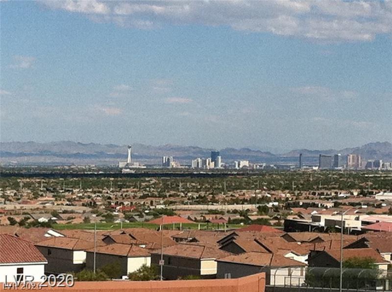 10550 West Alexander Road, Unit 1040 Las Vegas, NV 89129 - Photo 6 of 18 Distant city skyline views stretch across the desert valley below.