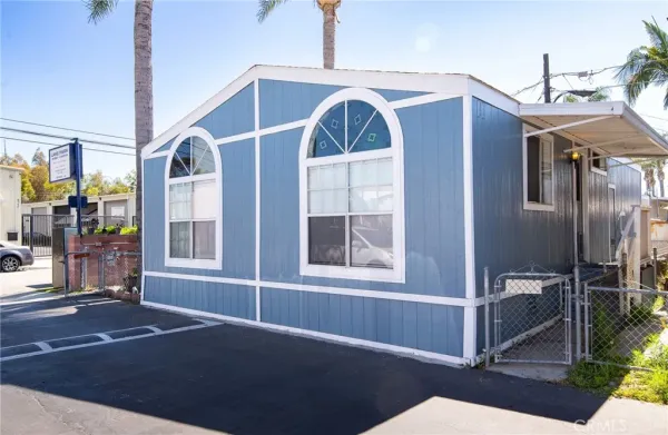 a front view of a house with a garage