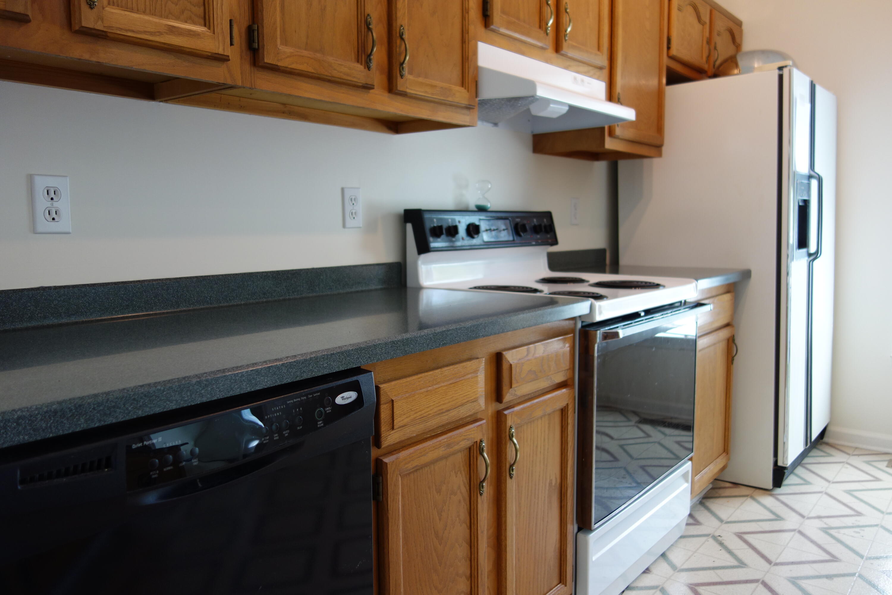 3356 Kenwick Trail Roanoke, VA 24018 - Photo 12 of 39 a kitchen with stainless steel appliances granite countertop a refrigerator a sink and a stove