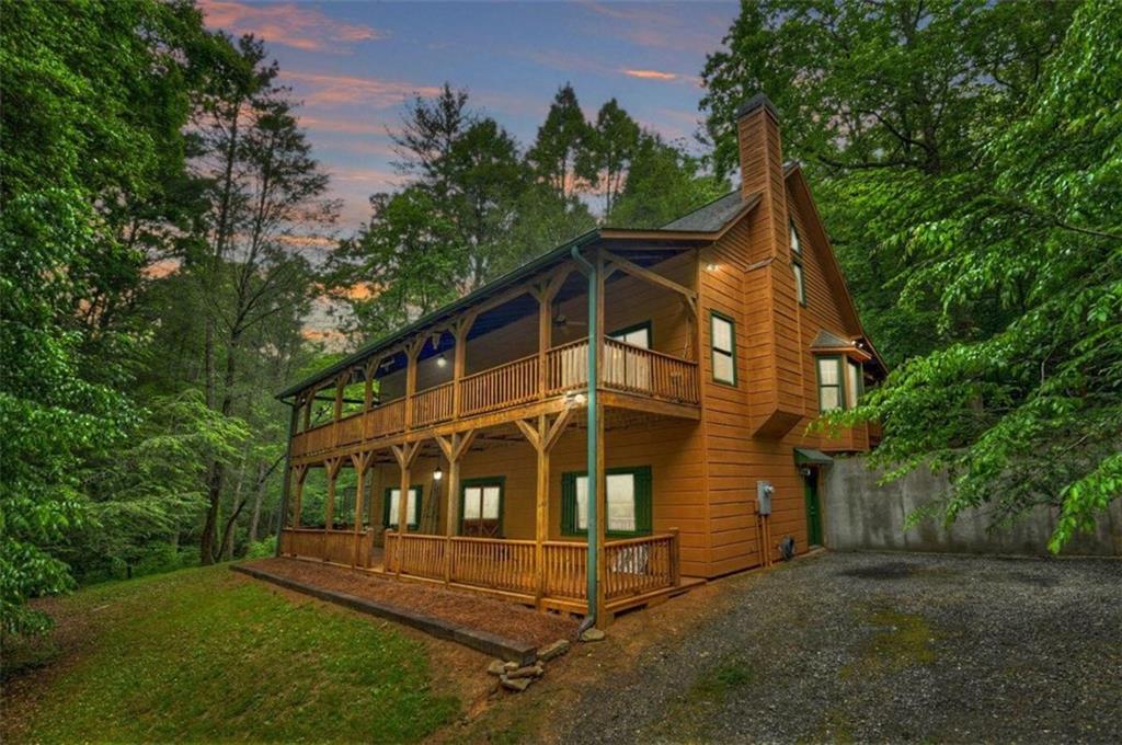83 Cole Road Ellijay, GA 30540 - Photo 1 of 1 a view of a house with a yard