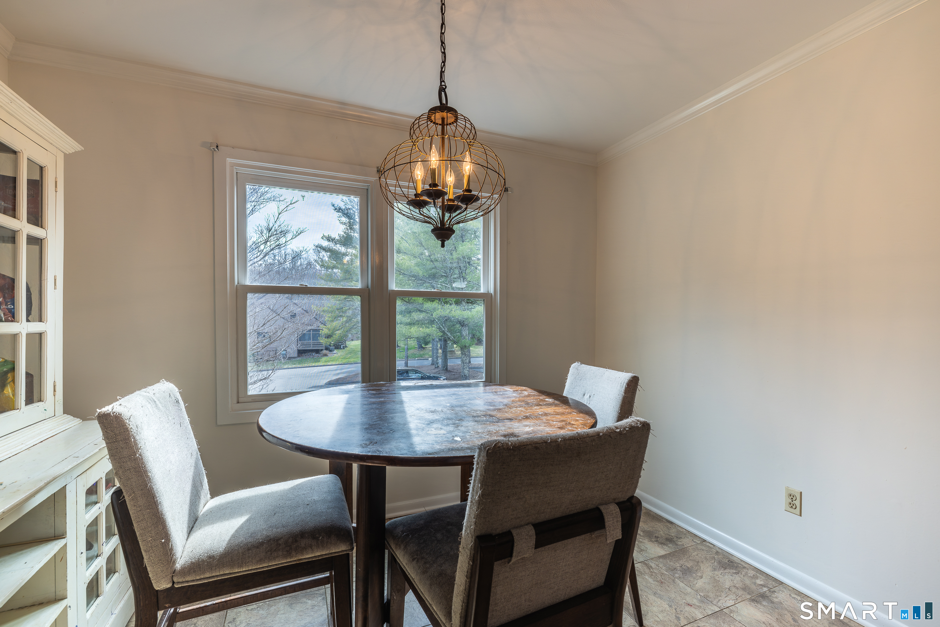 10 Juniper Circle, Unit 10 Monroe, CT 06468 - Photo 16 of 52 a view of a dining room with furniture window and outside view