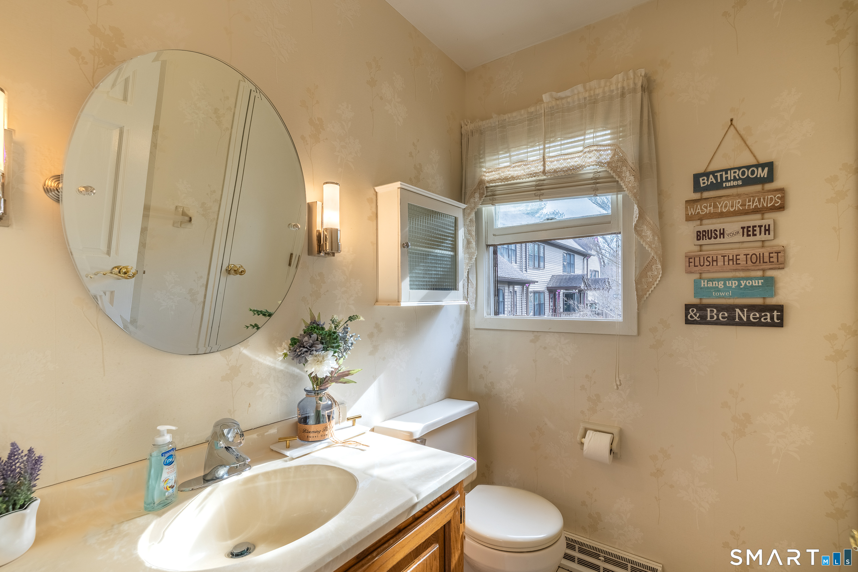 10 Juniper Circle, Unit 10 Monroe, CT 06468 - Photo 20 of 52 a bathroom with a sink a toilet and shower
