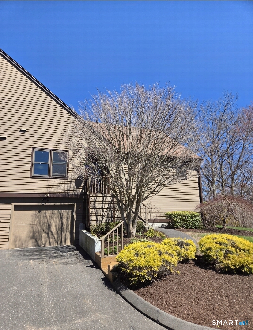 10 Juniper Circle, Unit 10 Monroe, CT 06468 - Photo 6 of 52 a view of a house with snow on the side of it