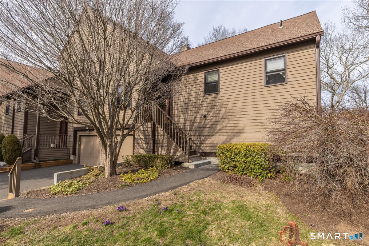 10 Juniper Circle, Unit 10 Monroe, CT 06468 - Photo 8 of 52 a view of a house with a yard