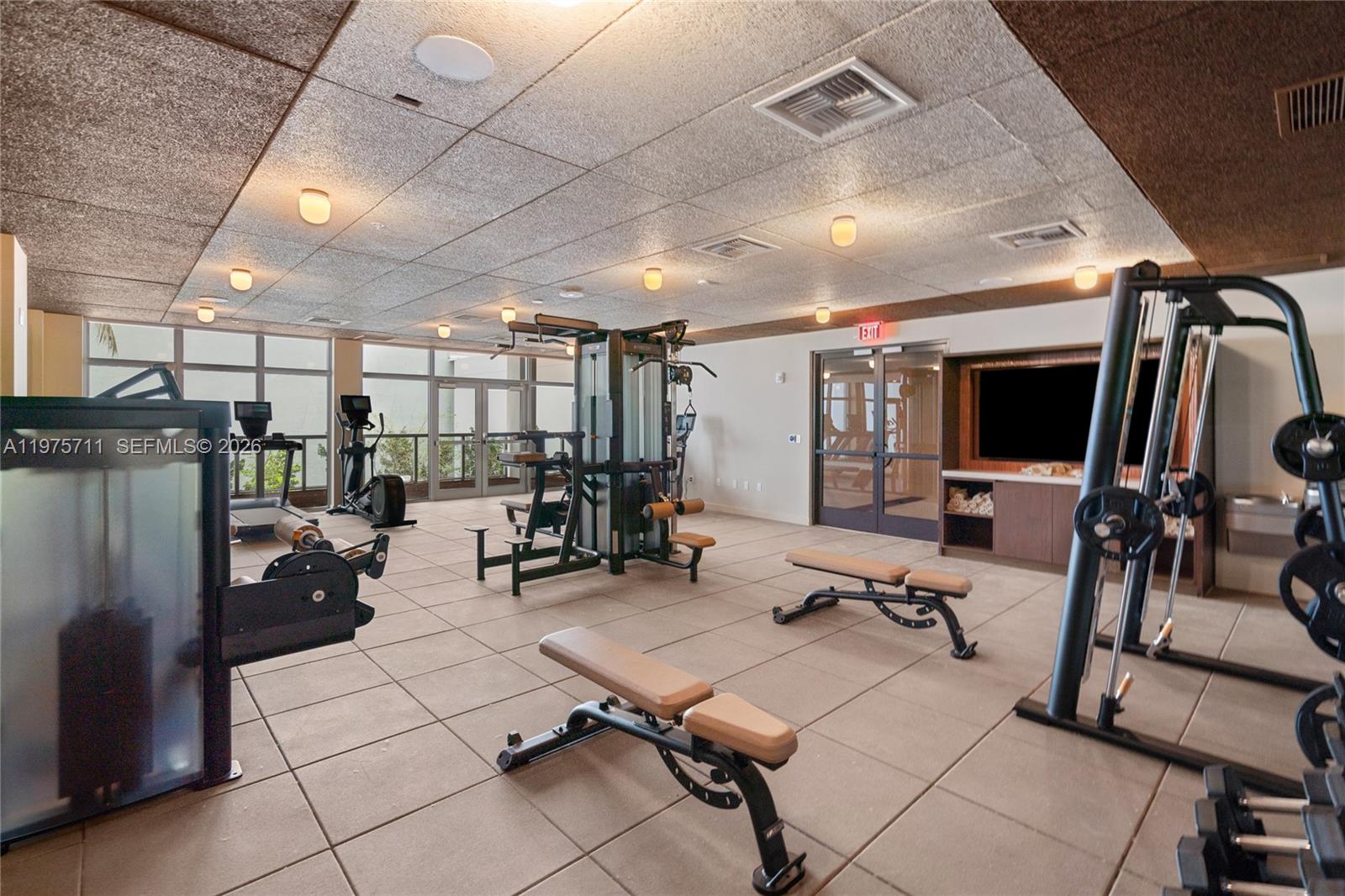 1611 Southwest 2nd Avenue, Unit 504 Miami, FL 33129 - Photo 13 of 17 a view of a room with gym equipment