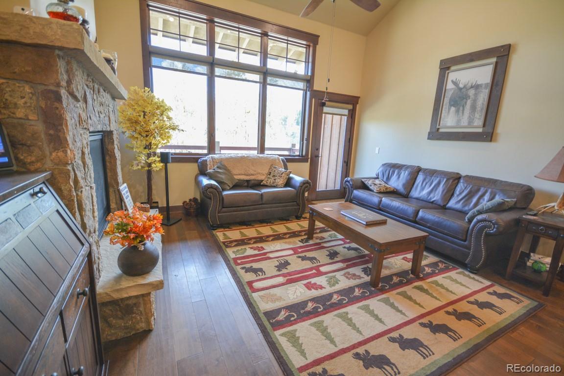 833 Independence Road Keystone, CO 80435 - Photo 3 of 38 a living room with furniture and a floor to ceiling window